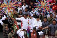 Jokowi-Ma'ruf dalam karnaval Indonesia Satu.