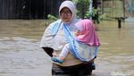 Begini Ragam Aktivitas Warga Bandung Ditengah Banjir