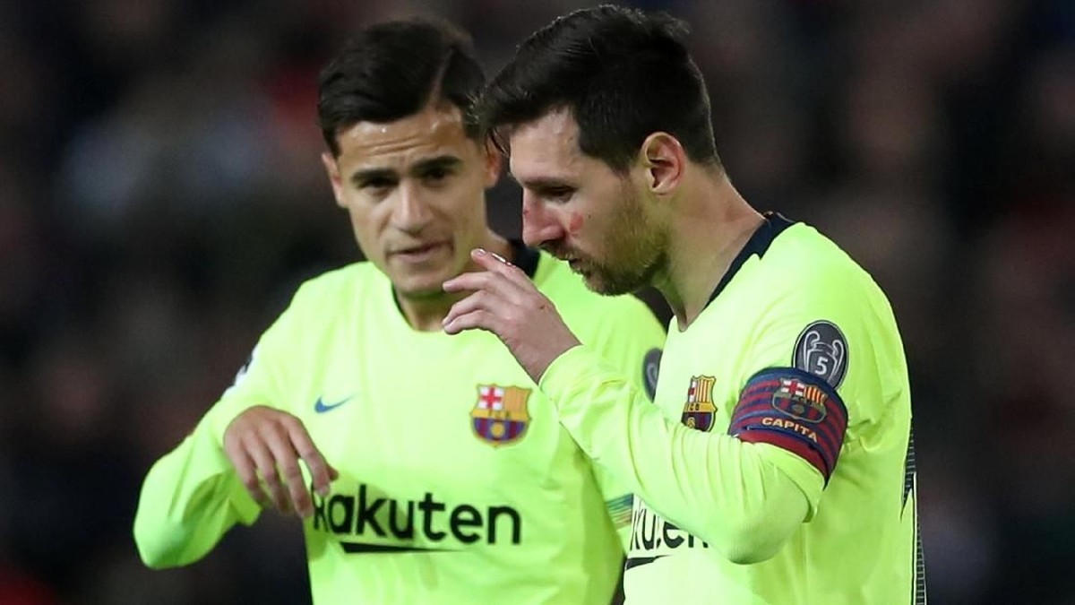 Philippe Coutinho dan Lionel Messi. (Foto: Lee Smith/Reuters)