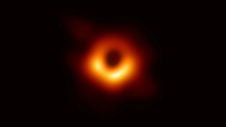 REFILE - CORRECTING SPELLING The first ever photo of a black hole, taken using a global network of telescopes, conducted by the Event Horizon Telescope (EHT) project, to gain insight into celestial objects with gravitational fields so strong that no matter or light can escape, is shown in this handout released April 10, 2019.  Event Horizon Telescope (EHT)/National Science Foundation/Handout via REUTERS   ATTENTION EDITORS - THIS IMAGE WAS PROVIDED BY A THIRD PARTY.  NO RESALES. NO ARCHIVE. TPX IMAGES OF THE DAY
