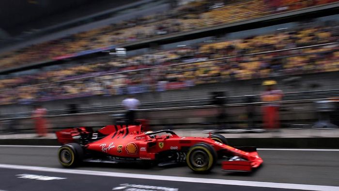 Sebastian Vettel menjadi yang tercepat di sesi latihan bebas pertama GP China (Foto: Aly Song/Reuters) Sebastian Vettel menjadi yang tercepat di sesi latihan bebas pertama GP China (Foto: Aly Song/Reuters)
