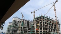 Pekerja dan alat berat terus mengerjakan pembangunan proyek Meikarta di Cikarang, Jumat (12/4/2019).