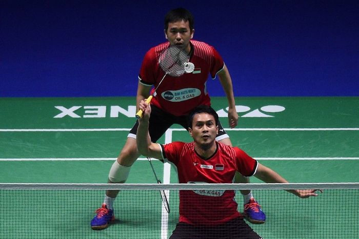 Hendra Setiawan/Mohammad Ahsan gagal juara di Singapura Terbuka 2019. (Foto: Oli Scarff / AFP) Hendra Setiawan/Mohammad Ahsan gagal juara di Singapura Terbuka 2019. (Foto: Oli Scarff / AFP)