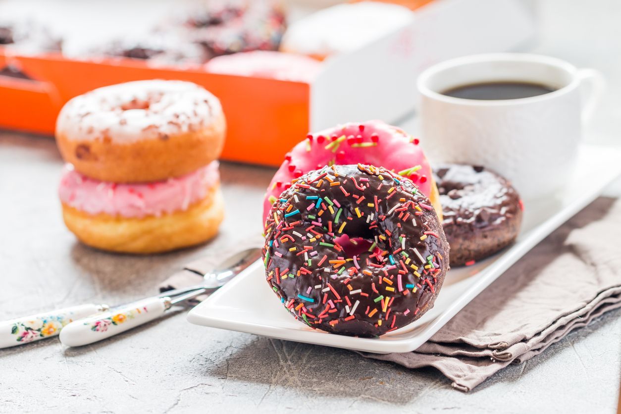 Fast food breakfast with donut and coffee