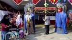 Unik! Petugas di TPS Nusantara Pakai Baju Adat Khas Indonesia