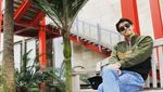 Foto: Gaya Liburannya Sehun, Personil Exo yang Punya Senyum Manis