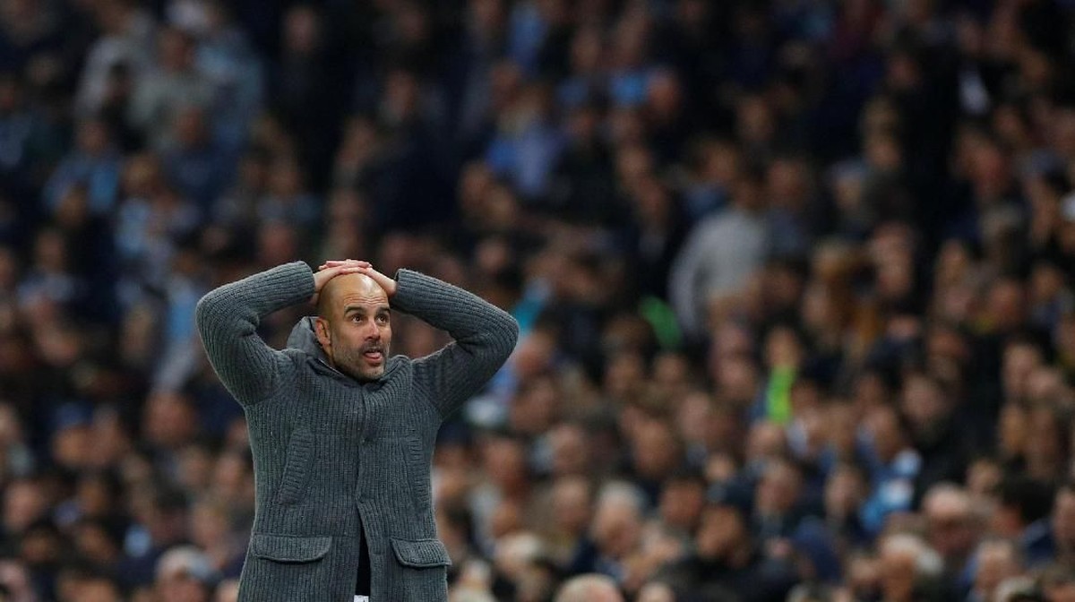Pep Guardiola membawa Manchester City memimpin persaingan gelar hingga menatap laga pekan terakhir. Foto: Phil Noble/Reuters)