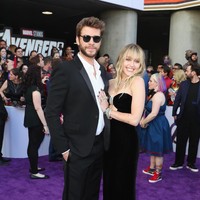 Di karpet merah, sejoli ini tak segan untuk memamerkan kemesraannya sebagai pengantin baru. Liam dan Miley resmi menjadi suami-istri dalam sebuah acara pernikahan yang intim di rumah mereka. (Foto: Getty Images)