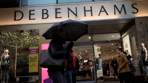 FILE PHOTO: Shoppers walk past the Debenhams department store on Oxford Street in London, Britain December 15, 2018. REUTERS/Simon Dawson/File Photo