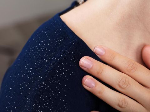 Close-up Of A Woman's Hands Using Sign Language