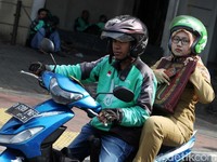 Go-Jek Batal Demo, Jokowi Teken Aturan THR PNS Cair 24 Mei