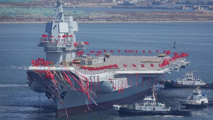FILE PHOTO - Chinas first domestically built aircraft carrier is seen during its launch ceremony in Dalian, Liaoning province, China, April 26, 2017. To match Special Report CHINA-ARMY/NAVY     REUTERS/Stringer/File Photo ATTENTION EDITORS - THIS IMAGE WAS PROVIDED BY A THIRD PARTY. CHINA OUT.