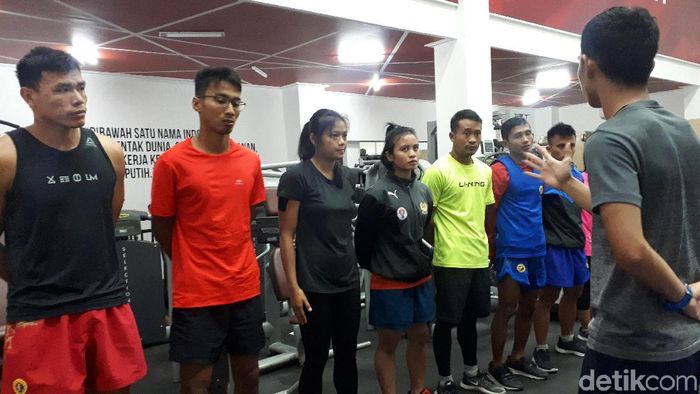 Yusuf Widiyanto, pewushu di kelas 56 kg putra (kelima dari kiri). (Mercy Raya/detikSport) Yusuf Widiyanto, pewushu di kelas 56 kg putra (kelima dari kiri). (Mercy Raya/detikSport)