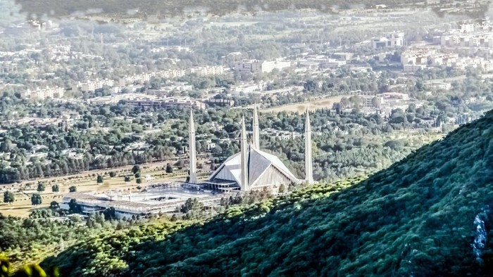 Faisal Mosque is the mosque in Islamabad, Pakistan. Located on the foothills of Margalla Hills in Islamabad, the mosque features a contemporary desing consisting of eight sides ofconcrete shell and is inspired by a Bedouin tent.