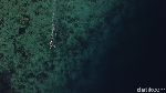 Foto Drone: Pulau dengan Perairan Sejernih Kristal di NTT