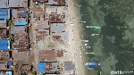 Foto Drone: Pulau dengan Perairan Sejernih Kristal di NTT