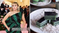 Miley Cyrus juga kelihatan unik dengan balutan gaun hitam dan hijau. Sampai-sampai penampilannya mirip kue lapis. Foto: Twitter @semangkasegar