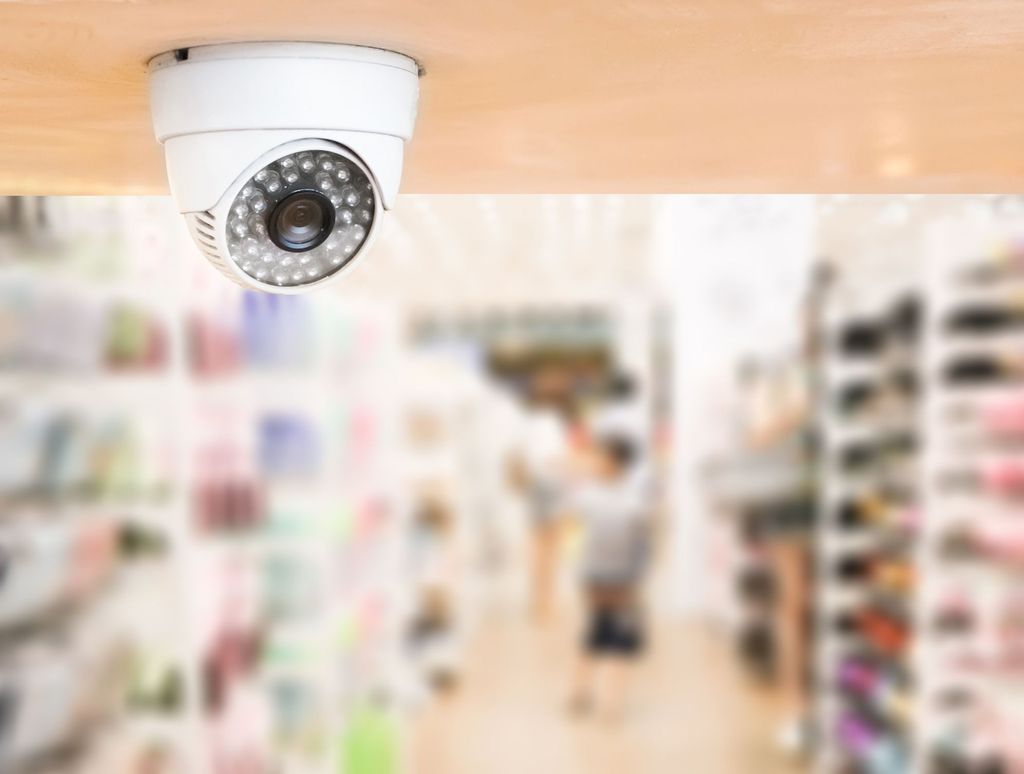 CCTV system security inside of stationery store.Surveillance camera installed on ceiling to monitor for protection customer in grocery shop