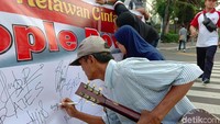 Aliansi Mahasiswa dan Pemuda Cinta NKRI mengajak masyarakat menandatangi petisi menolak gerakan people power. dok. Aliansi Mahasiswa Cinta NKRI