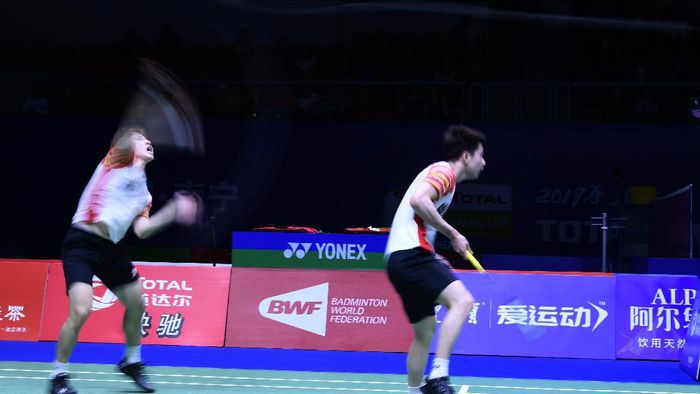 Kevin Sanjaya Sukamuljo/Marcus Fernaldi Gideon membuka rekening poin untuk Indonesia di perempatfinal Piala Sudirman 2019. (Wahyu Putro A/Antara Foto)