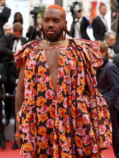 DJ Kiddy Smile pakai gaun di red carpet Cannes Film Festival. Foto: Getty Images DJ Kiddy Smile pakai gaun di red carpet Cannes Film Festival. Foto: Getty Images