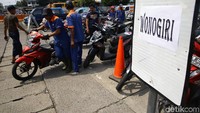 Sepeda motor dikelompokan berdasarkan kota tujuan.