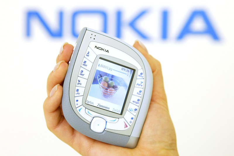 HANOVER, GERMANY - MARCH 18:  A model holds the new Nokia 7600 mobile phone at the CeBIT technology trade fair March 18, 2004 in Hanover, Germany. The 7600 is both UMTS and GMS standard capable. This year a total of 6,411 exhibitors are taking part in the seven-day fair.     (Photo Sean Gallup/Getty Images)