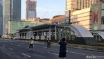 Potret Heboh Warga Foto-foto di Tengah Jalan Saat Lebaran