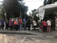 Antrean warga di luar rumah Anies