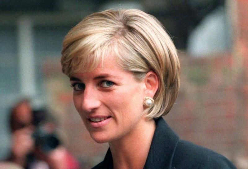 Princess Diana arrives at the Royal Geographical Society in London for a speech on the dangers of landmines throughout the world June 12, 1997. REUTERS/Ian Waldie