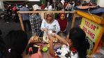 Libur Lebaran Bawa Berkah PKL Kota Tua