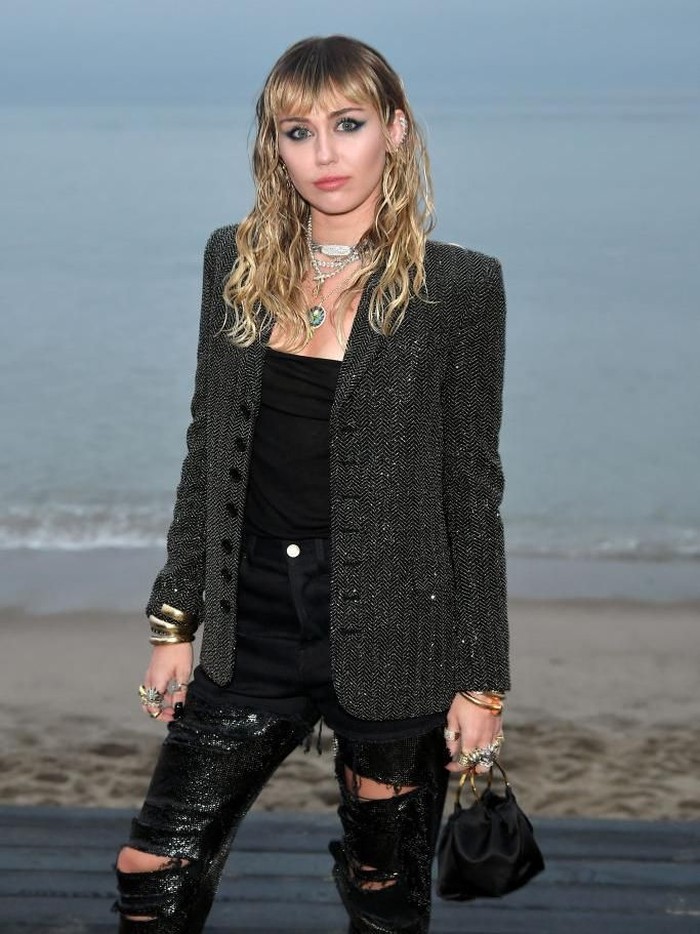 MALIBU, CALIFORNIA - JUNE 06: Miley Cyrus attends the Saint Laurent Mens Spring Summer 20 Show on June 06, 2019 in Paradise Cove Malibu, California. (Photo by Neilson Barnard/Getty Images)
