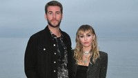 Setelah menikah, Miley dan Liam semakin mesra, ya! Foto: Miley Cyrus dan Liam Hemsworth (Getty Images/Neilson Barnard)
