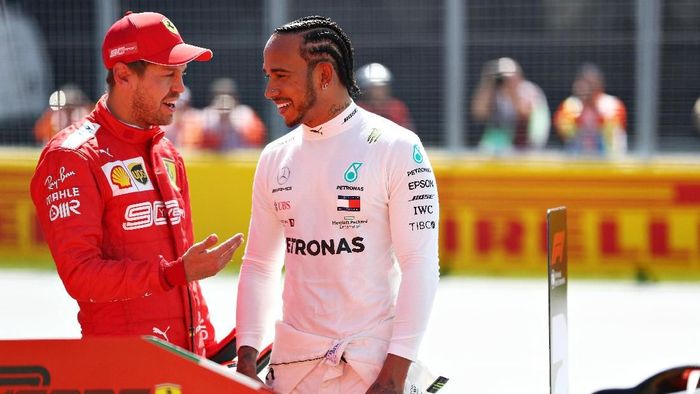 Lewis Hamilton turut senang Sebastian Vettel pole di GP Kanada (Mark Thompson/Getty Images) Lewis Hamilton turut senang Sebastian Vettel pole di GP Kanada (Mark Thompson/Getty Images)