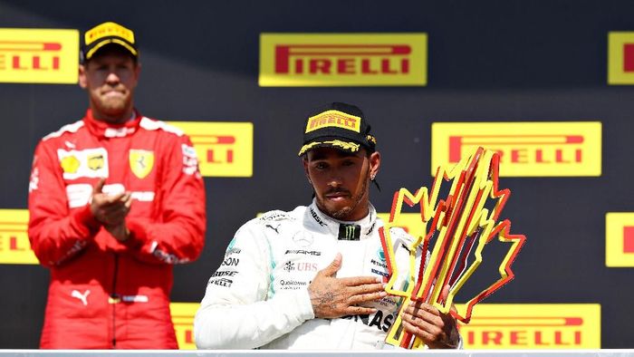 Lewis Hamilton makin kokoh berdiri di puncak klasemen pebalap F1 usai jadi pemenang GP Kanada (Mark Thompson/Getty Images) Lewis Hamilton makin kokoh berdiri di puncak klasemen pebalap F1 usai jadi pemenang GP Kanada (Mark Thompson/Getty Images)