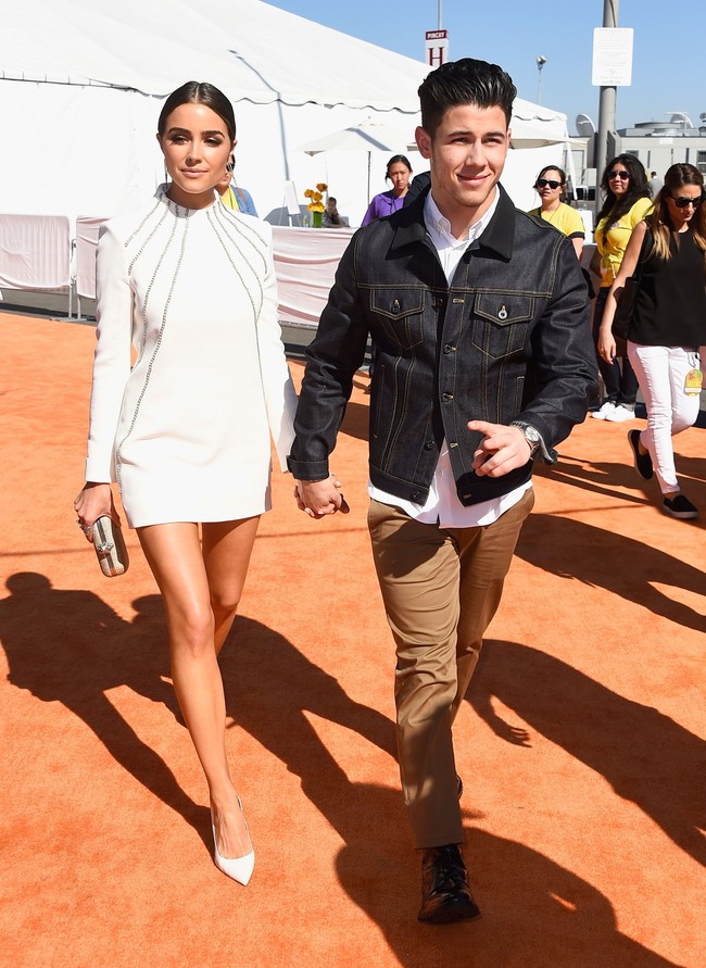 Eksis di dunia hiburan membuat kehidupan pribadi Olivia terus disorot. Seperti hubungan cintanya dengan Nick Jonas yang kini telah menjadi suami dari aktris Priyanka Chopra. Dimulai sejak 2013, hubungan tersebut hanya bertahan selama dua tahun. (Foto: Getty Images)