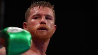 Petinju Meksiko, Saul Canelo Alvarez, dikontrak DAZN senilai 365 juta dolar AS. Angka sebesar itu mengikatnya selama lima tahun, sejak 2018 hingga 2023. (Foto: Al Bello/Getty Images)