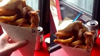 Bolongan di tengah meja restoran ini punya fungsi khusus lho. Fungsinya untuk menaruh cone yang jadi kemasan menu restoran. Foto: Istimewa