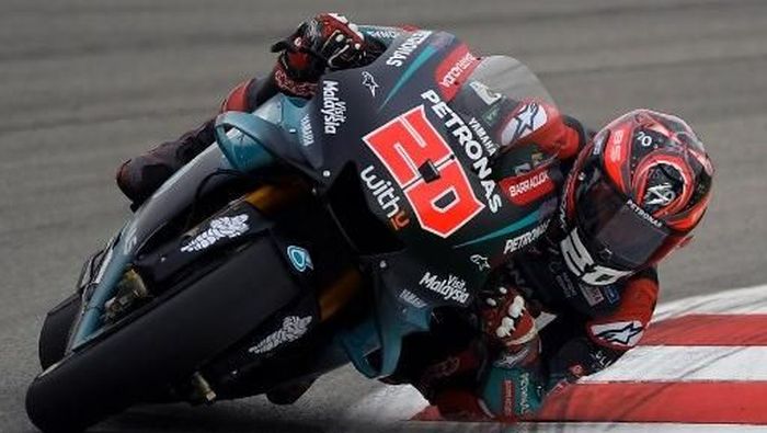 Rider Petrinas Yamaha SRT, Fabio Quartararo, di free practice II MotoGP Catalunya. (Foto: Lluis Gene/AFP) Rider Petrinas Yamaha SRT, Fabio Quartararo, di free practice II MotoGP Catalunya. (Foto: Lluis Gene/AFP)