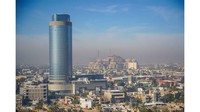 Fotografer Norwegia Christian Lindgren terbang ke Irak untuk liburan anti mainstream. Ia berkeliling ke tempat-tempat bersejarah negara itu, ini lanskap Kota Baghdad (Christian Lindgren/CNN)