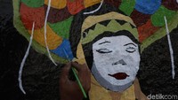 Mural tersebut mejeng di kawasan Jalan KH Abdullah Syafei, Bukit Duri, Jakarta Selatan, Rabu (19/6/2019).