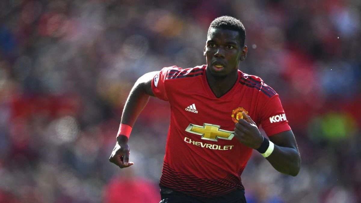 Paul Pogba santer dikabarkan bakal menjadi pemain Real Madrid. (Foto: Stu Forster/Getty Images)