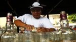 Kreatif! Botol Bekas Disulap Jadi Tempat Lampu dan Lilin