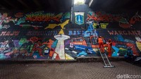 Penampakan mural yang dibuat oleh komunitas mural untuk menyambut HUT Jakarta ke-492.