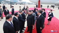 Kunjungan Xi ini terjadi seminggu sebelum pertemuan tingkat tinggi G20 di Jepang, di mana ia dijadwalkan untuk bertemu dengan Presiden Amerika Serikat Donald Trump. North Koreas Korean Central News Agency (KCNA) via Reuters.