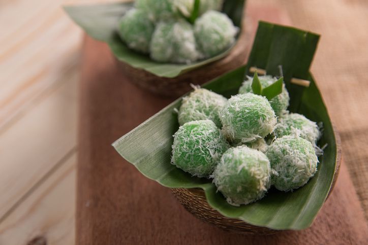 Indonesian Cuisine, Klepon or Traditional Pandanus Rice Balls Made From Glutinous Flour and Grated Coconut with Palm sugar Filling.