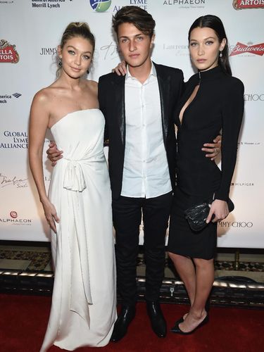 NEW YORK, NY - SEPTEMBER 07:  Bella Hadid (L) and Anwar Hadid attend as Harper's BAZAAR Celebrates 