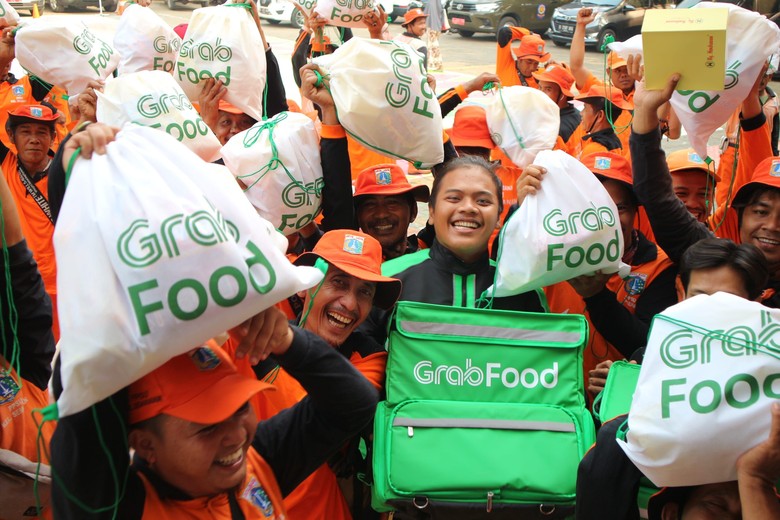 HUT Jakarta, GrabFood Beri Sembako ke 500 Pasukan Oranye HUT Jakarta, GrabFood Beri Sembako ke 500 Pasukan Oranye