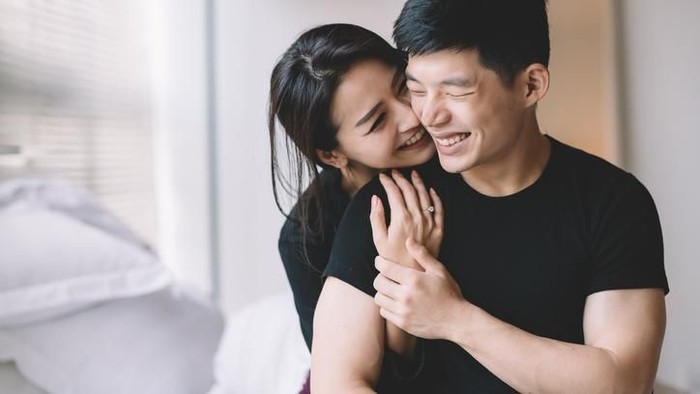 asian chinese couple hugging and bonding time