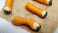 Puntung rokok yang satu ini sayang kalau dilewatkan. Churchill mengolahnya dari cokelat dan bubuk meringue hitam. Foto: Istimewa